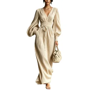 Elegant pleated long sleeve maxi dress with V-neck and cinched waist in beige color