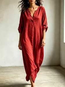 Elegant V-neck washed terracotta maxi dress with roll-tab sleeves and loose holiday fit.