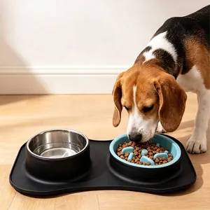 Double dog bowl set with stainless steel bowl and slow feeder on black silicone mat.