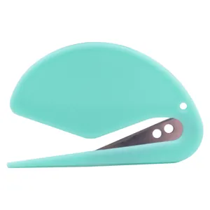 Mini strumento per la rimozione dei nodi del pelo di gatti e cani color menta