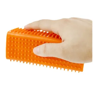 Professional handheld orange pet hair remover brush for effective carpet cleaning
