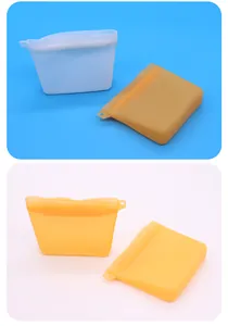Vue détaillée des pochettes à friandises en silicone imperméable en blanc et orange