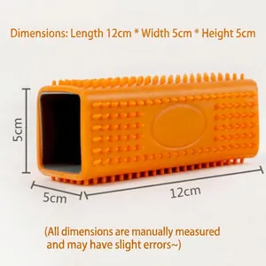 Orange silicone pet hair remover brush with dimensions 12x5x5 cm on white background