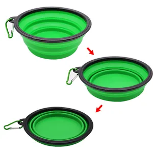 Green collapsible silicone dog bowl with carabiner for portable pet feeding