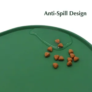 Waterproof green silicone pet feeding mat featuring a raised edge anti-overflow design