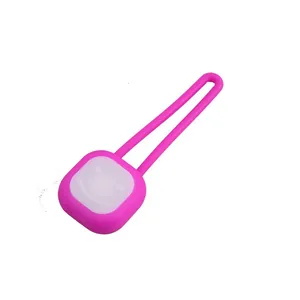Pink LED pet safety light, silicone charm with smiley face for night walking dogs