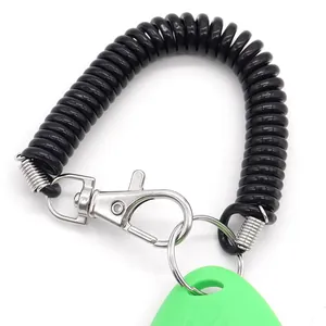 Black elastic spiral wrist strap with metal lobster clasp and green pet training clicker