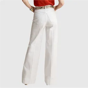 Back view showing the fit and pocket details of white high-waisted wide-leg denim pants.