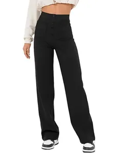 Détail de la taille haute boutonnée sur ce pantalon décontracté noir pour femme