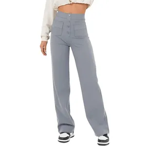 Détail du pantalon décontracté à taille haute avec boutons et poches avant pour femmes.