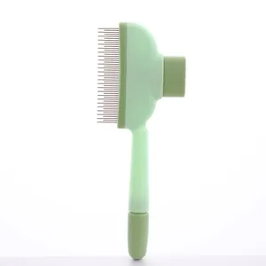Detalle del perfil de un cepillo autolimpiante verde menta para perros y gatos