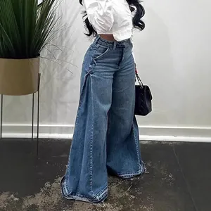 Women's stylish high waisted blue washed wide leg jeans with frayed floor length hem