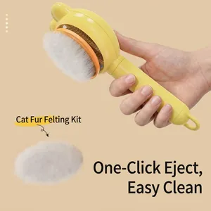 Spazzola autopulente per la toelettatura dei gatti con orecchie di gatto e manico giallo
