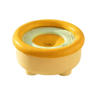 Yellow and green floating pet water bowl for cats and dogs with slow feeder disk