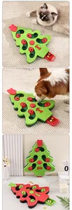 Christmas tree shaped slow feeder puzzle toy for dogs and cats shown in use with pets