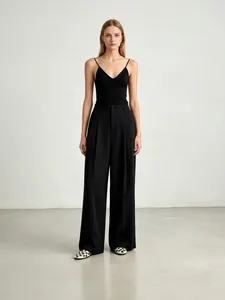 Minimalistische schwarze Hose mit hoher Taille und weitem Bein für den Business-Look