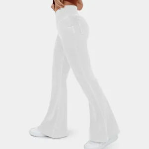 Side view detail of white high-waisted stretchy flared denim pants with flared legs.