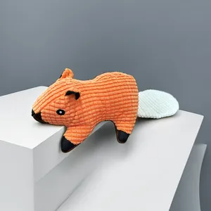 Macro view showing the durable corduroy texture of the orange squirrel pet plush toy