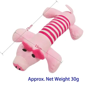 Vue détaillée montrant la longueur de 23 cm et la texture rayée du jouet pour chien cochon.