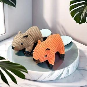 Detailed view of two corduroy squirrel plush pet toys on a marble display stand.