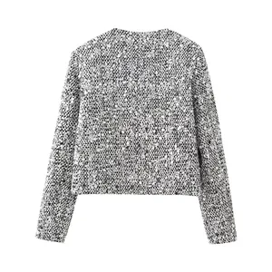 Back view of a shimmering silver sequin tweed jacket with a round neck and cropped fit