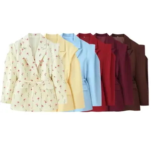 Detailed view of multi-color belted blazers with broad shoulders and notched lapels
