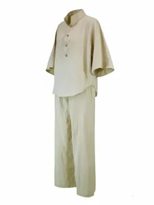 Side view of a loose beige summer outfit featuring bell sleeves and wide long pants