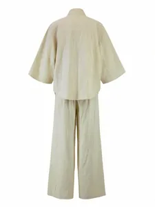 Back view of loose bell-sleeve shirt and wide-leg trousers casual two-piece set