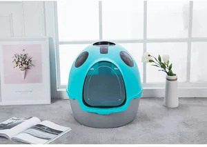 Premium fully enclosed ladybug-shaped cat litter box displayed in a bright modern home setting