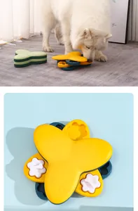 Vue détaillée d'un puzzle pour animaux jaune rotatif avec des inserts en forme d'os.