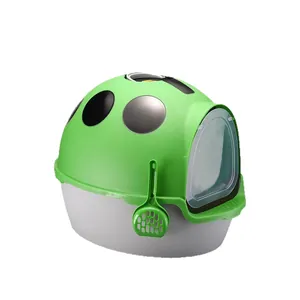 Large enclosed ladybug-shaped cat litter box in green and grey with matching scoop
