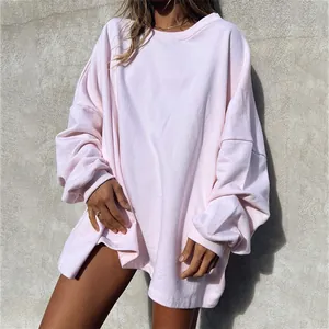 Detailed view of light pink oversized sweatshirt showing its soft and premium cotton fabric