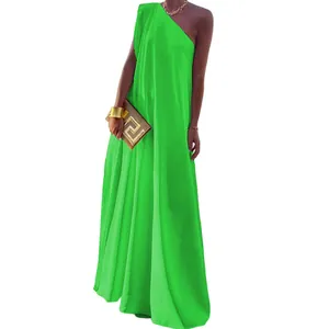 Detail view of vibrant lime green one-shoulder sleeveless maxi dress for banquet event