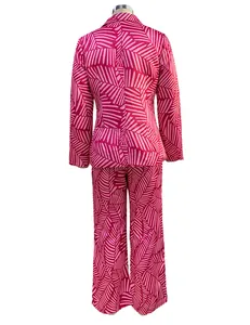 Detailed back view of a fashionable pink striped blazer and straight-leg pants suit