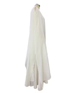 Elegant white floor-length evening gown with flowing cape sleeves on mannequin.