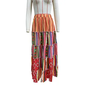 Bohemian tiered maxi skirt with colorful ethnic prints and high waist design.