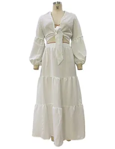 Detailed front view of white bohemian puff sleeve two-piece set with tie-front top