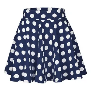 Full view of the navy blue polka dot mini skirt showing the flared A-line cut detail
