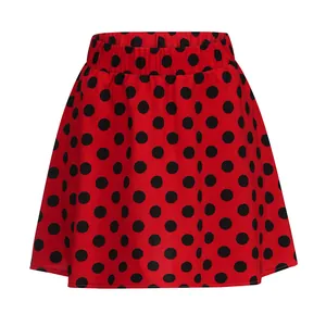Detailed front view of a vibrant red mini skirt featuring classic black polka dot patterns