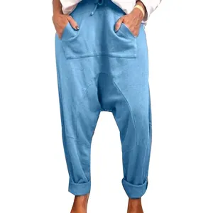 Women's casual light blue drop-crotch harem pants with drawstring and pockets detail view