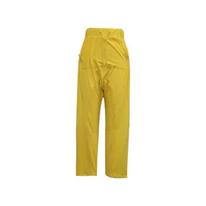 Detail of yellow drop-crotch harem pants showing drawstring waist and knit fabric texture.