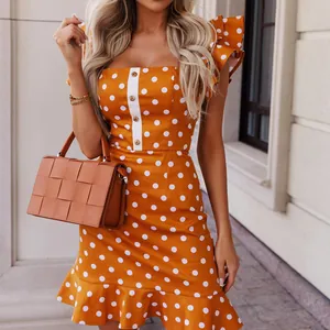 Fashionable orange polka dot mini dress with ruffle sleeves and button details