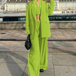 Chic vibrant lime green women's 3-piece suit set including blazer, crop top and trousers