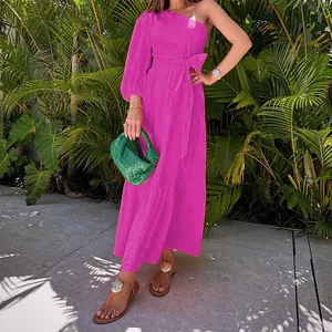 Full detail view of a stylish fuchsia one-shoulder cotton linen maxi dress with waist tie.
