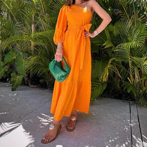 Vibrant orange one-shoulder cotton linen maxi dress with tie-waist and puff sleeve