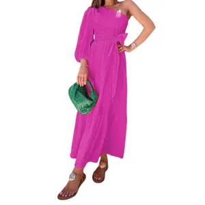 Elegant fuchsia one-shoulder linen midi dress with belted waist and puff sleeve.