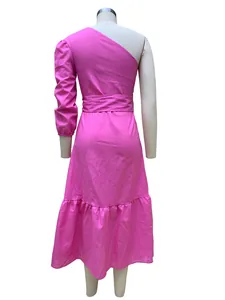 Back view of a vibrant magenta one-shoulder cotton linen midi dress on mannequin.