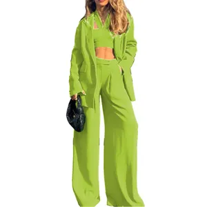 Full body view of a neon lime green 3-piece fashion suit with blazer and trousers