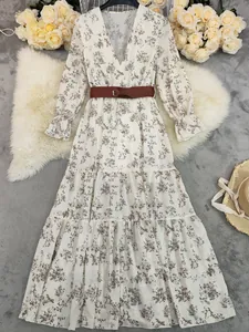 Bohemian floral print V-neck tiered maxi dress with belt, perfect for spring season