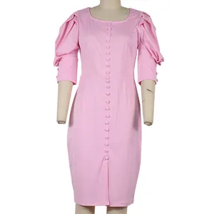 Detailed front view of the pink puff sleeve midi dress with elegant button closure